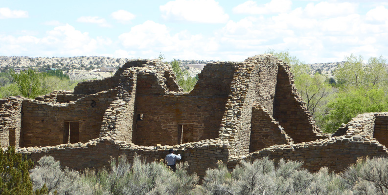 Ranger working on wall Aztec Ruins NM