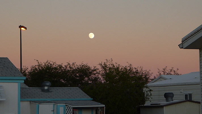 Full moon at sunset