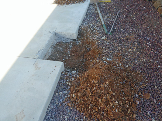 holes along concrete pad