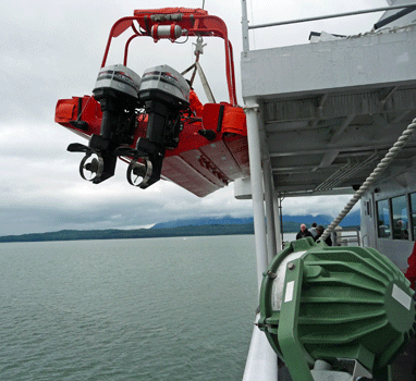 Ferry Tender being lowered Petersburg-Kake run