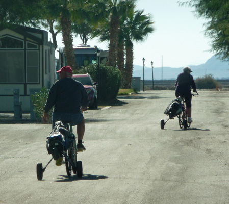 Bicycles towing golf clubs