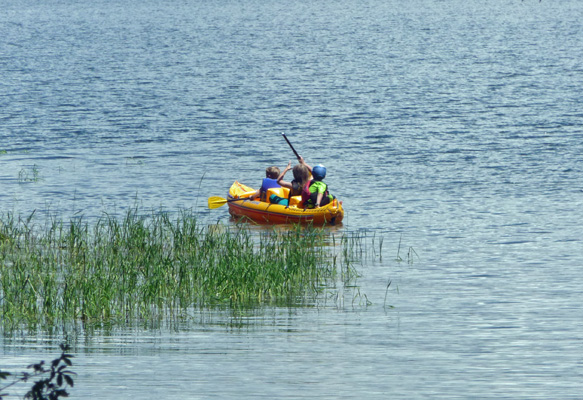 Kids in a rubber boat Buttercup Campground Lake Cascade SP