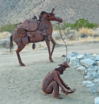 Old miner and his mule sculpture Borrego Springs CA