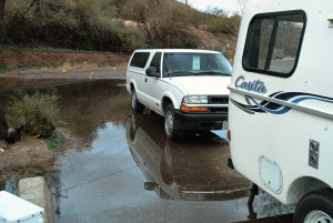 Trailer surrounded by water