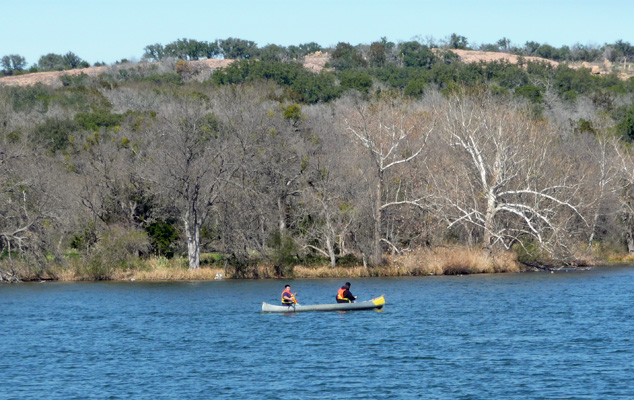 Kids in canoe Inks Lake SP