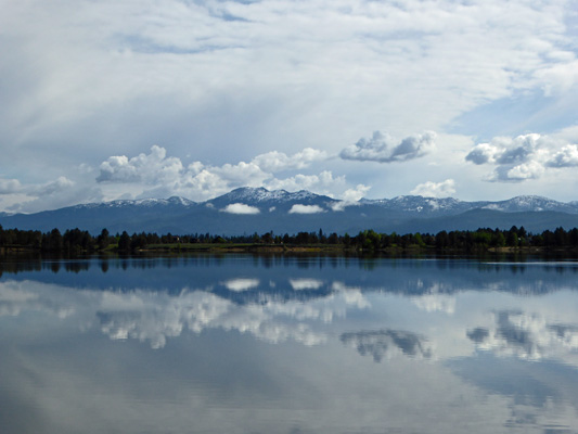 Clouds mirrored in Lake Cascade