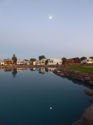 Full moon reflected in lake