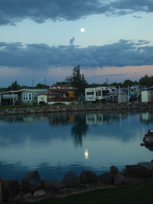 Full moon reflected in lake