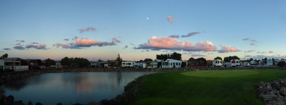 Sunset with moon hanging above