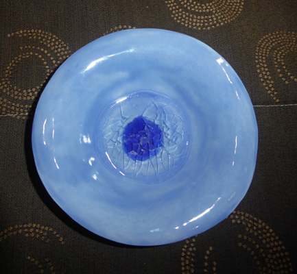 Pottery bowl with glass inside