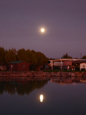 Full moon reflected in lake