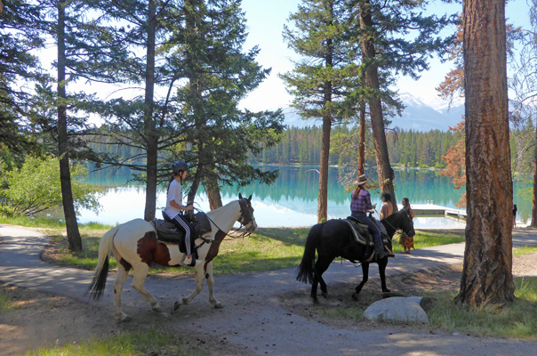 Horseback riders at Lake Annette