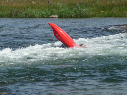 River kayaker flipping on purpose Kellys whitewater park ID