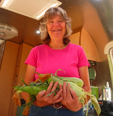 Sara Schurr armload of corn