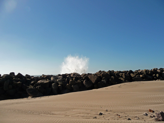 Wave over top of south jetty Fort Stevens SP