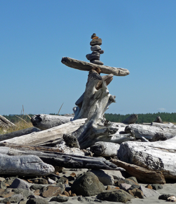 Rock and driftwood cairn South Jetty