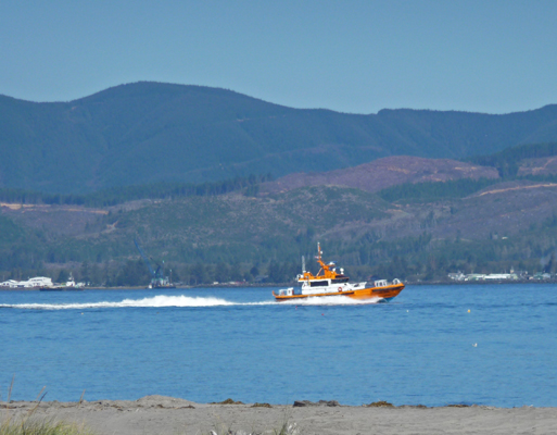 Boat heading up Columbia River