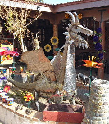 Metal sculpture dragons