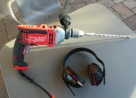 Hammer drill with 12" bit