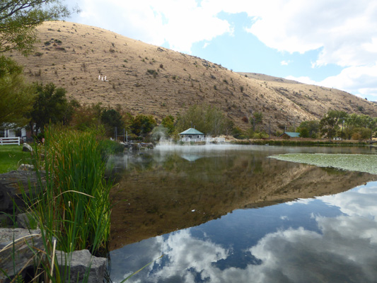 Hill reflected in Hot Lake